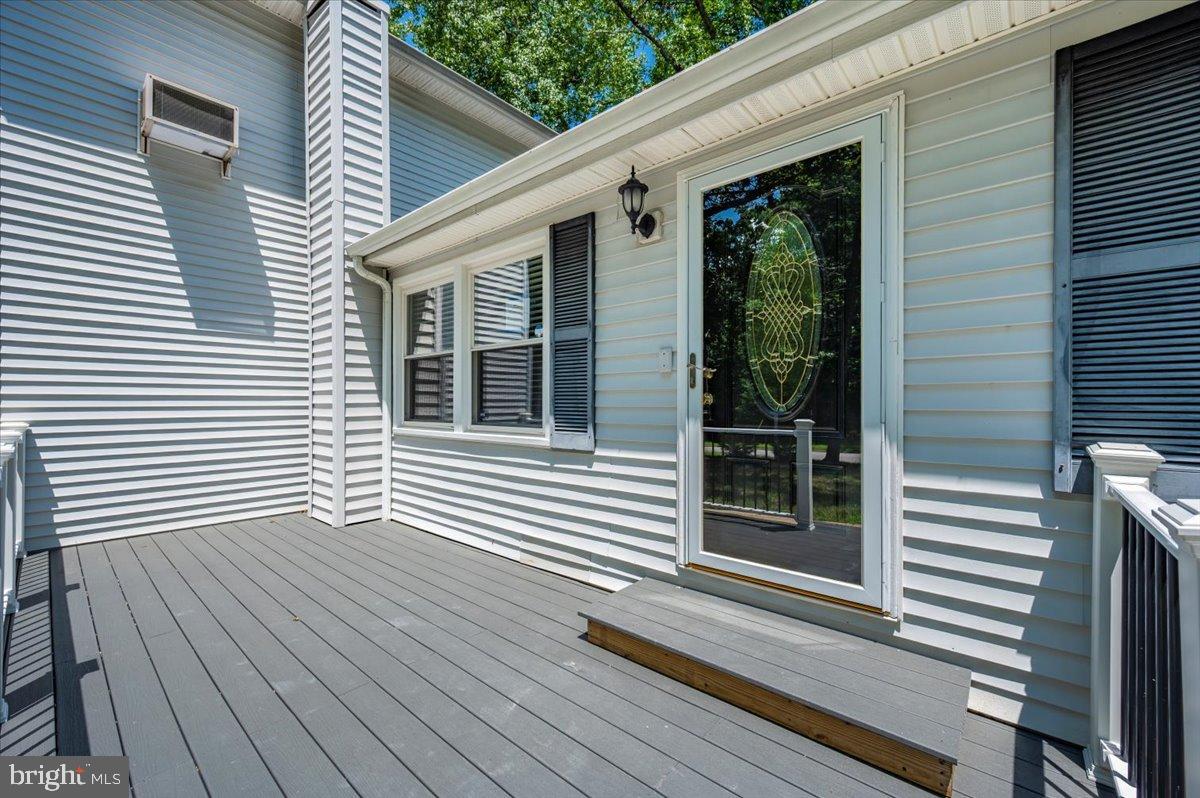 12284 Bandera Lane Lusby, MD 20657 - Photo 54 of 55 a view of a house with a large window