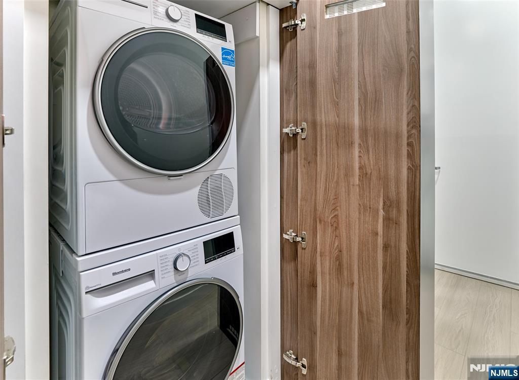 2100 Central Road, Unit 706B Fort Lee, NJ 07024 - Photo 19 of 19 a close up view of a washer and dryer