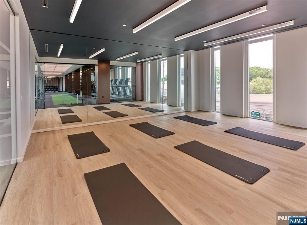 2100 Central Road, Unit 706B Fort Lee, NJ 07024 - Photo 7 of 19 a outdoor space with wooden floor and furniture