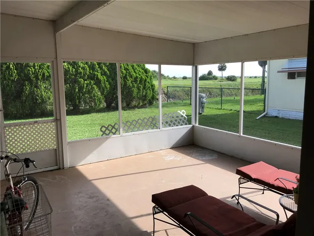 a house view with a sitting space and garden view