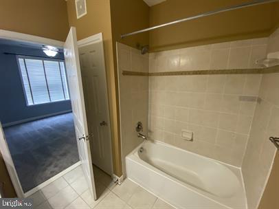 621 Cobblestone Boulevard, Unit T3 Fredericksburg, VA 22401 - Photo 17 of 34 a bathroom with a bathtub and a shower