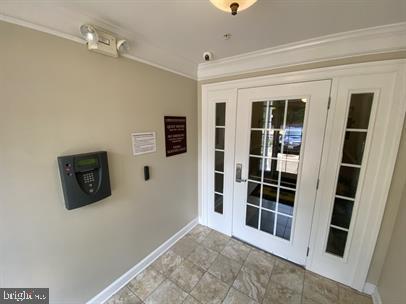 621 Cobblestone Boulevard, Unit T3 Fredericksburg, VA 22401 - Photo 3 of 34 a view of a big room with wooden floor and windows