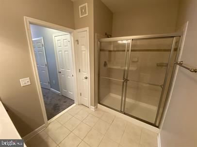 621 Cobblestone Boulevard, Unit T3 Fredericksburg, VA 22401 - Photo 32 of 34 a bathroom with a shower and a sink