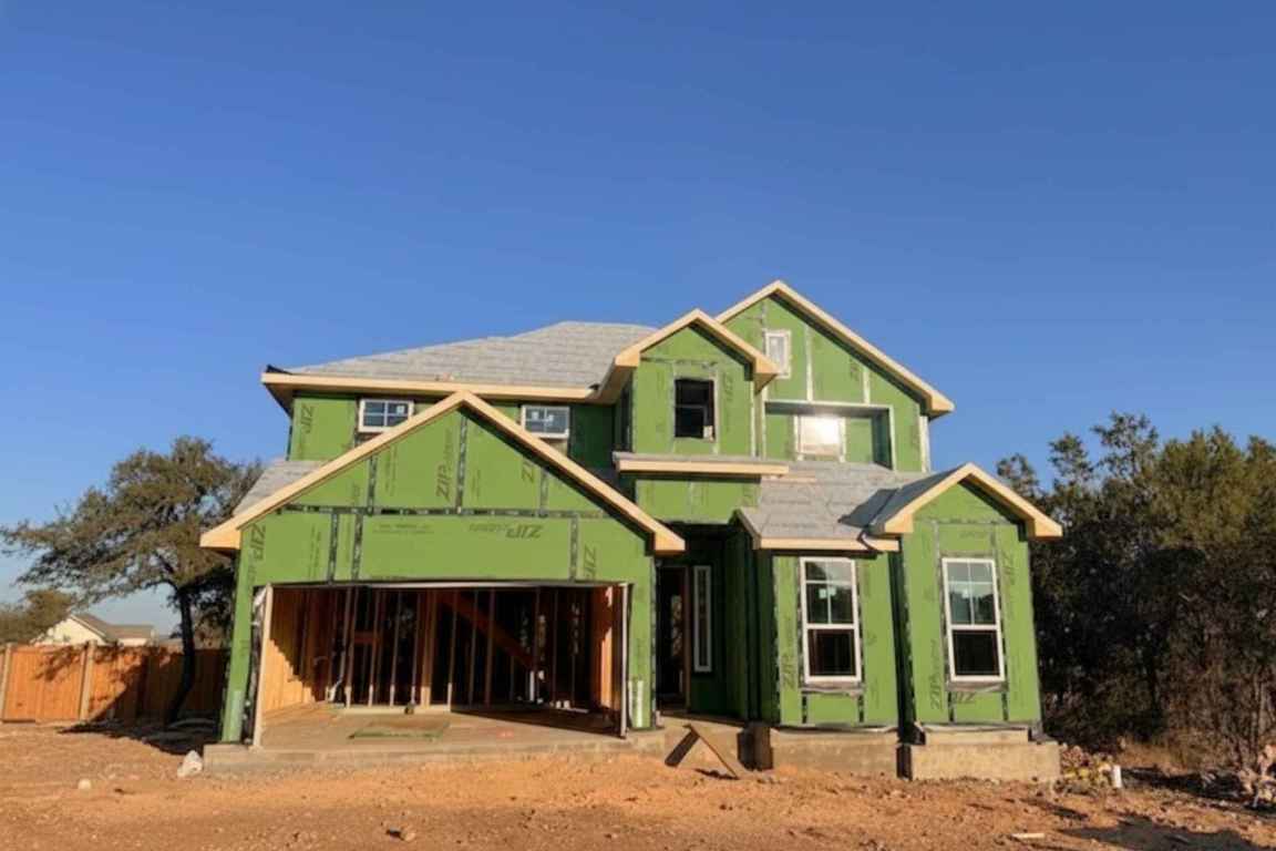 104 Beautiful Wisdom Court Georgetown, TX 78628 - Photo 1 of 29 a front view of a house with garden