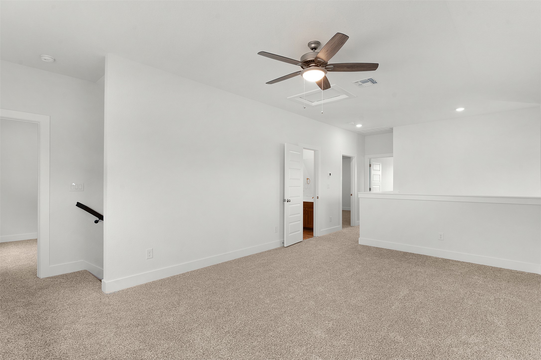 104 Beautiful Wisdom Court Georgetown, TX 78628 - Photo 20 of 33 a view of an empty room with a chandelier fan