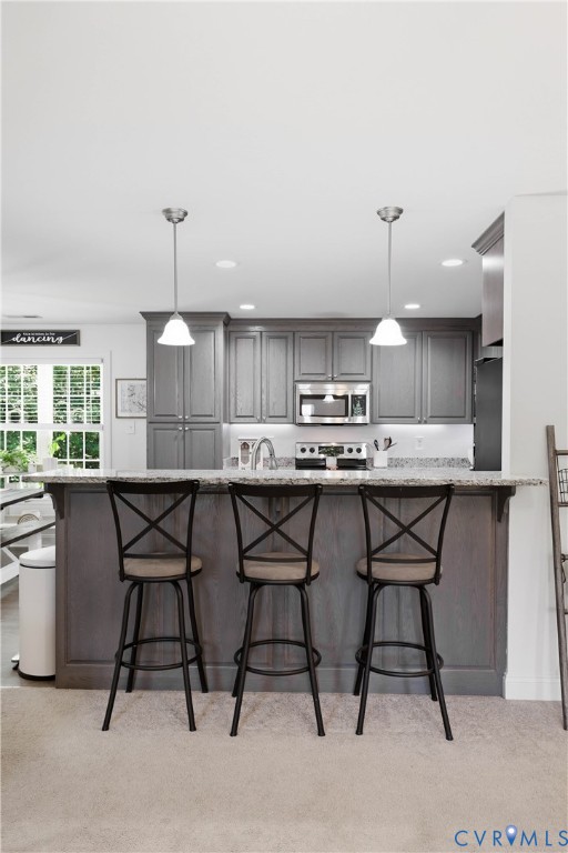 222 Oak Ridge Court Aylett, VA 23009 - Photo 10 of 35 Kitchen featuring gray cabinetry, stainless steel
