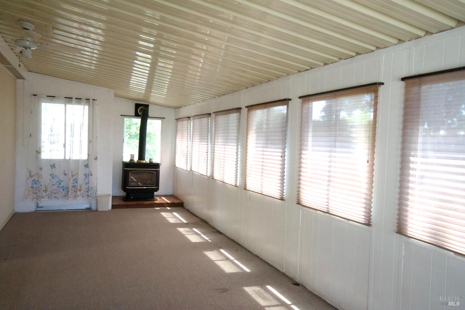 529 Colonial Park Drive Santa Rosa, CA 95403 - Photo 7 of 27 This enclosed porch also has a stove.