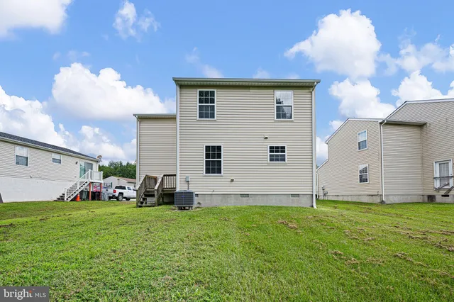 a front view of house with yard