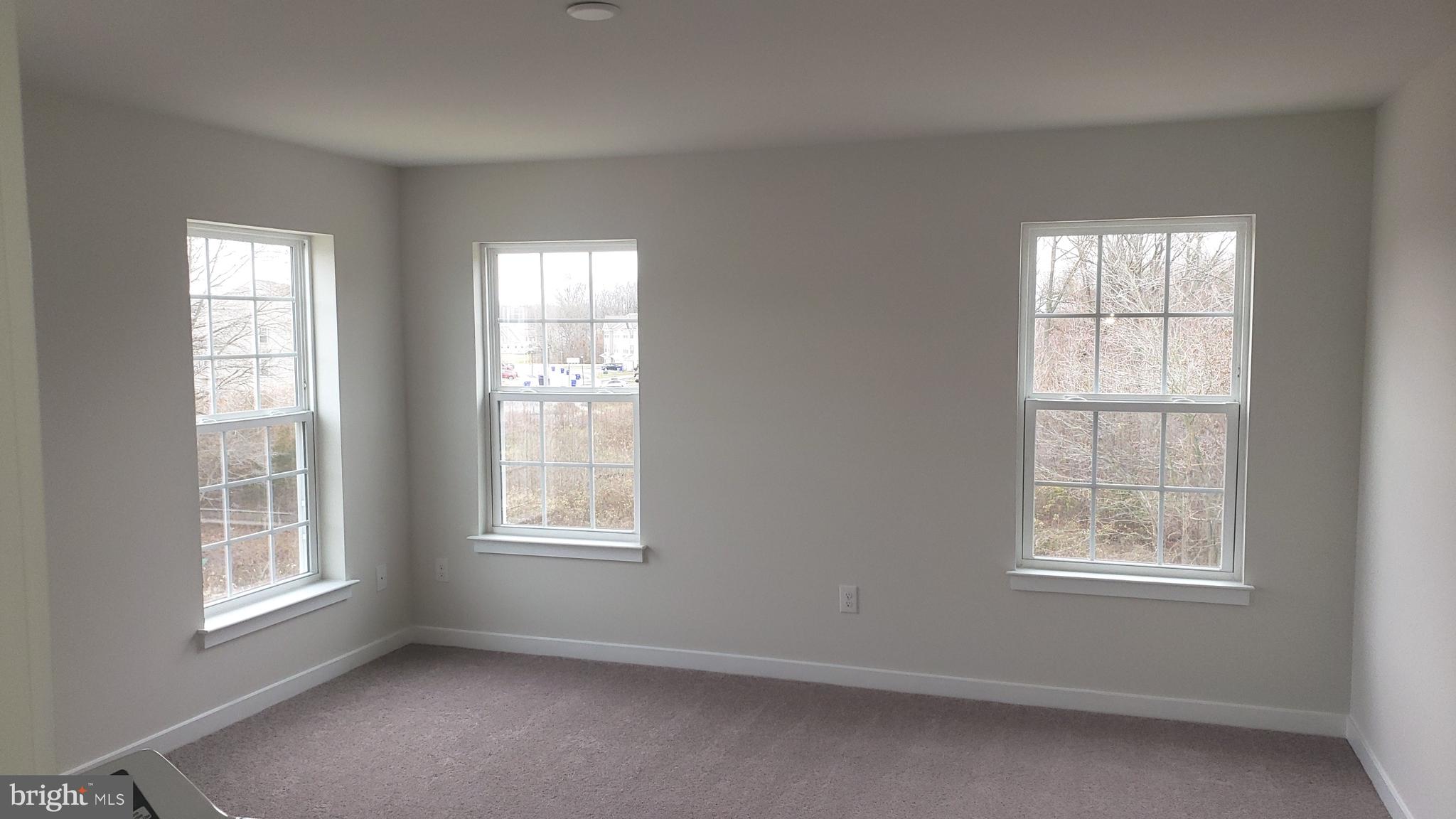 214 Case Road Townsend, DE 19734 - Photo 7 of 18 a view of an empty room with a window