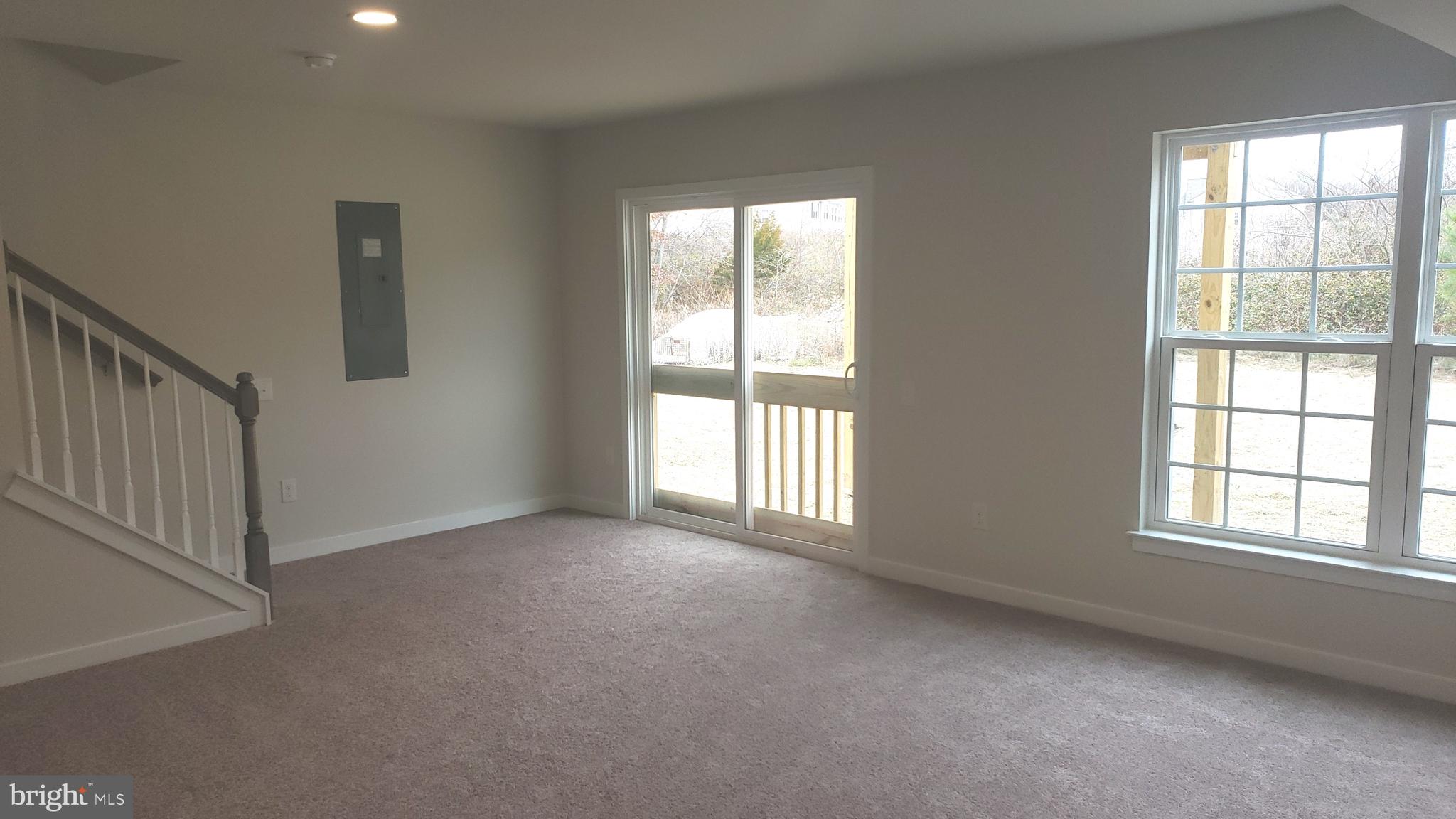 214 Case Road Townsend, DE 19734 - Photo 10 of 18 an empty room with windows