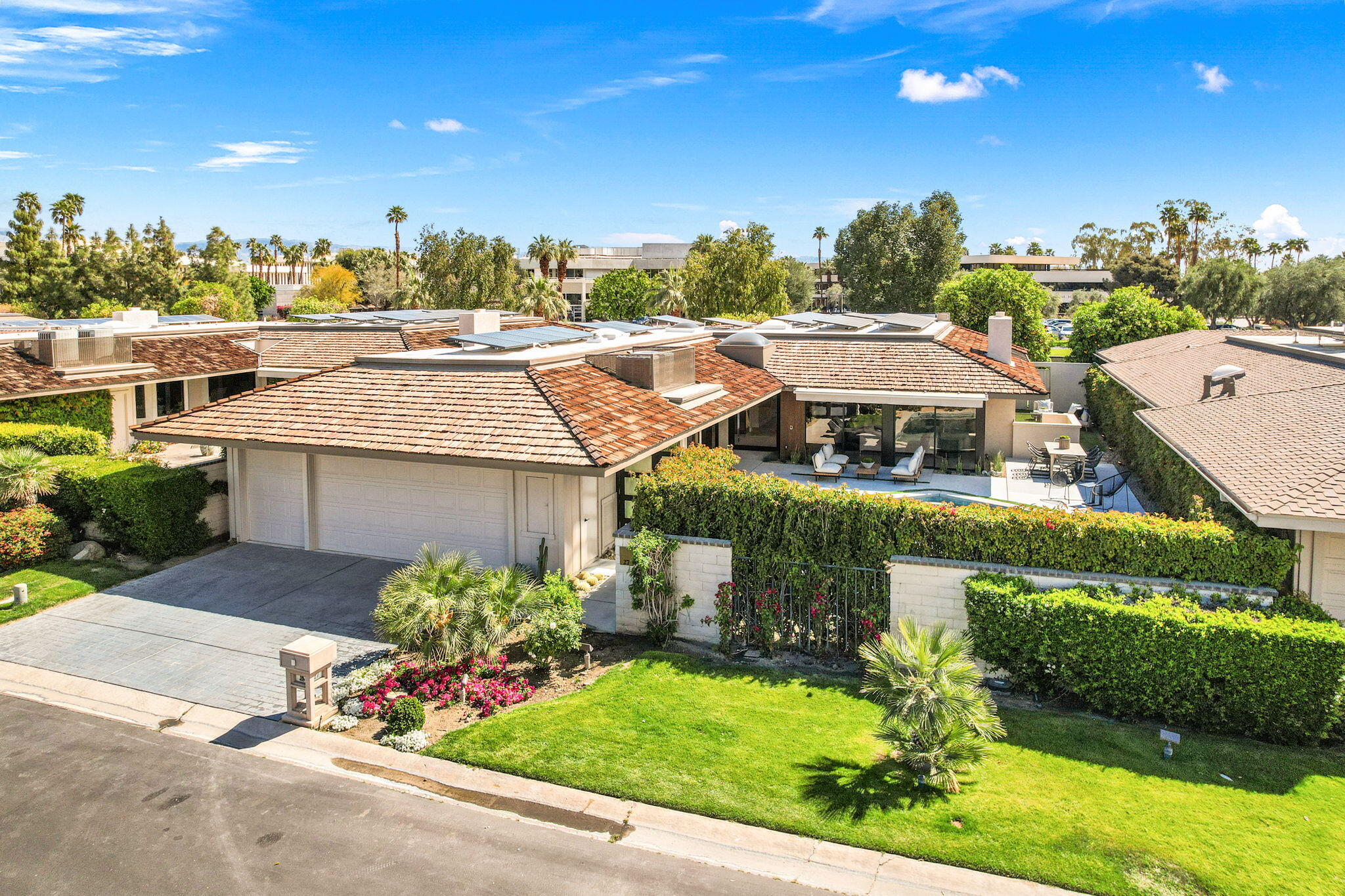 27 Colgate Drive Rancho Mirage, CA 92270 - Photo 3 of 87 an aerial view of a house with a garden