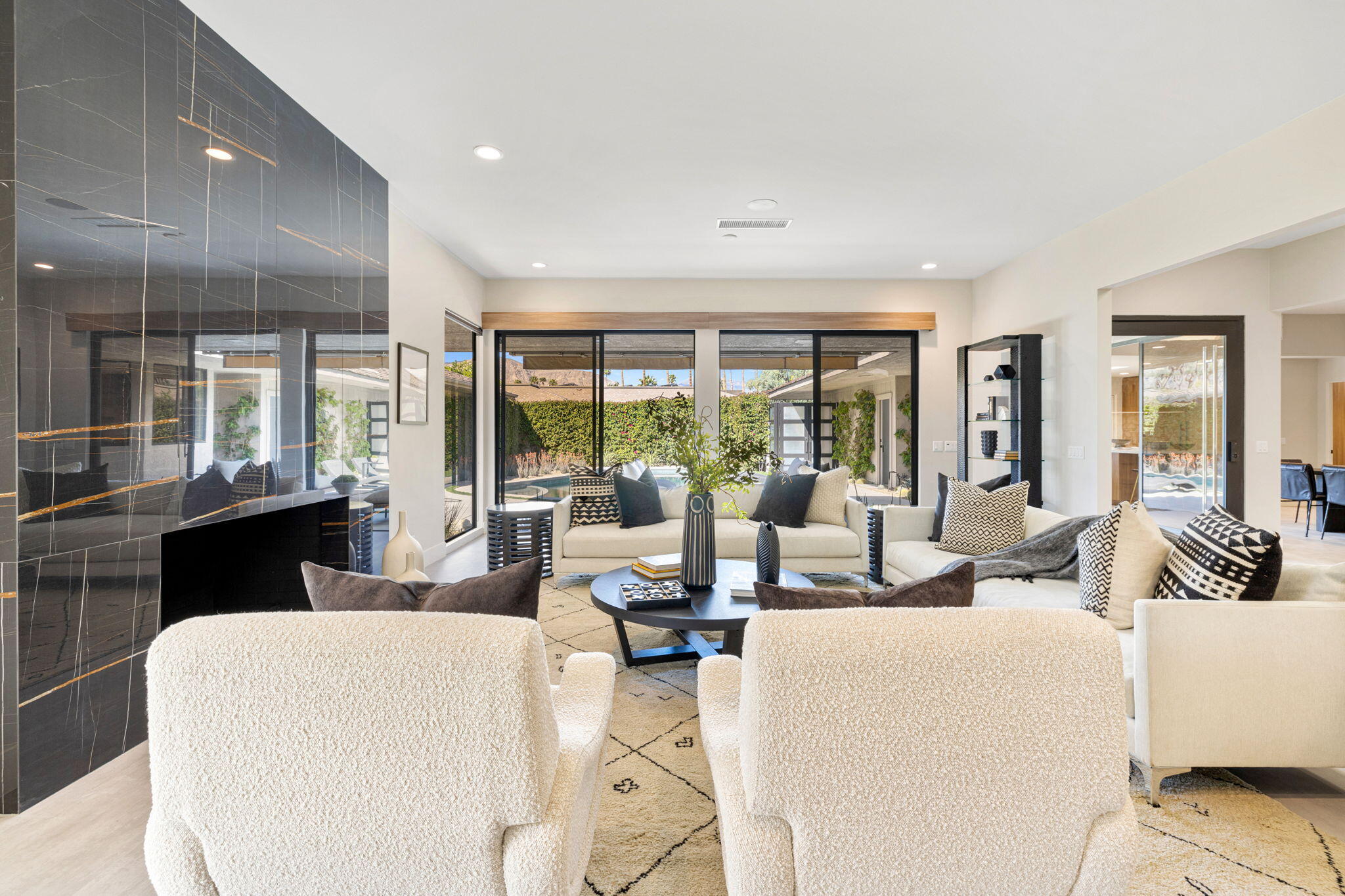 27 Colgate Drive Rancho Mirage, CA 92270 - Photo 47 of 87 a living room with fireplace furniture and a large window