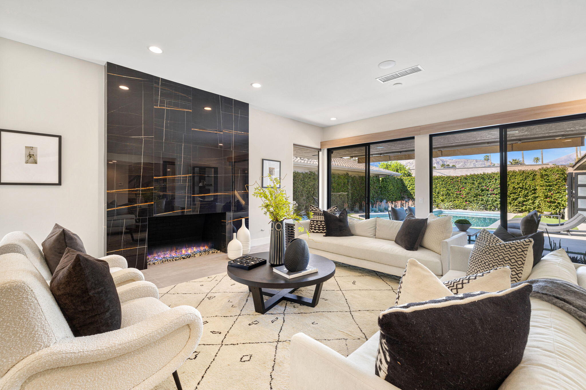 27 Colgate Drive Rancho Mirage, CA 92270 - Photo 50 of 87 a living room with furniture and a large window