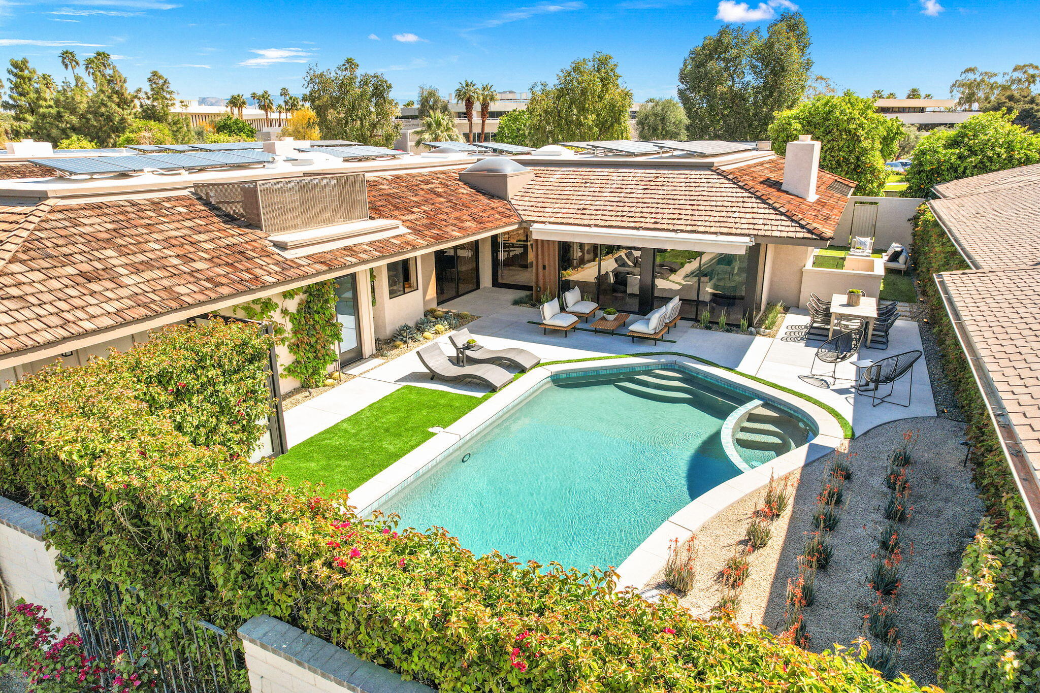 27 Colgate Drive Rancho Mirage, CA 92270 - Photo 5 of 87 an aerial view of a house with swimming pool garden and patio