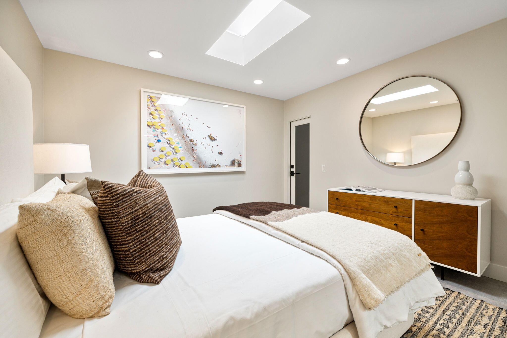 27 Colgate Drive Rancho Mirage, CA 92270 - Photo 66 of 87 a bedroom with a large bed and a large mirror