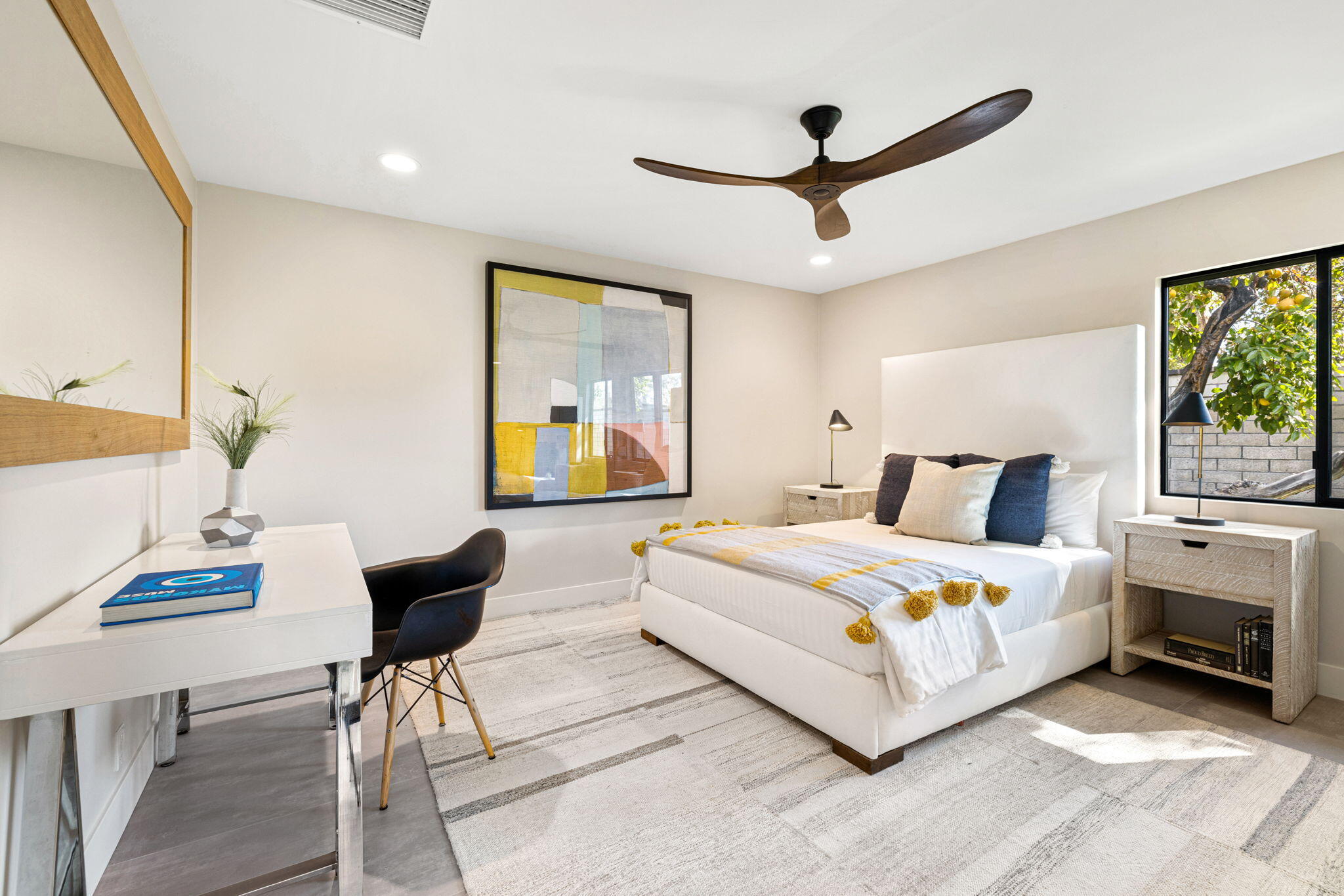 27 Colgate Drive Rancho Mirage, CA 92270 - Photo 67 of 87 a bedroom with a bed and a table in it