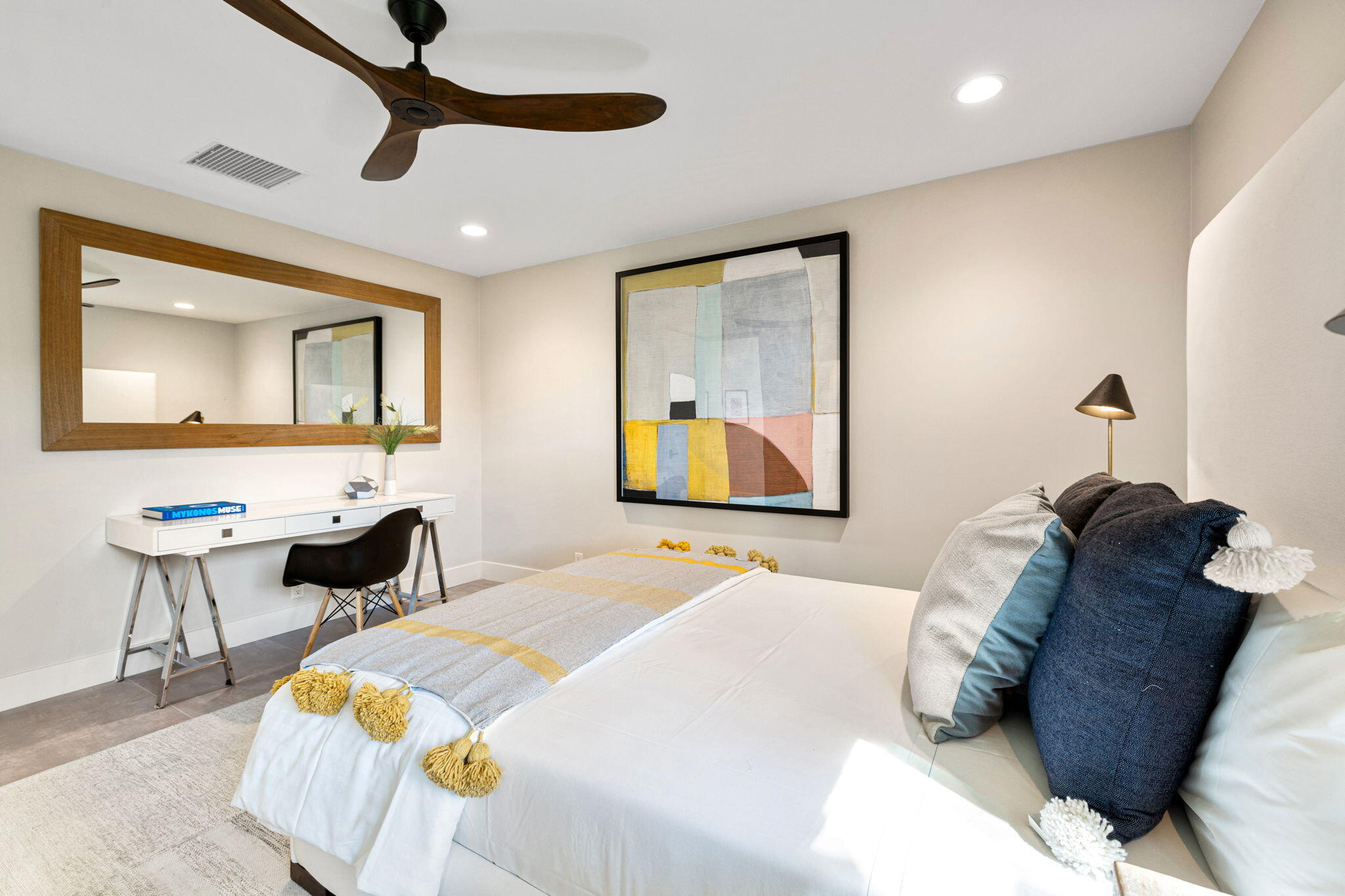 27 Colgate Drive Rancho Mirage, CA 92270 - Photo 69 of 87 a bedroom with a bed and wooden floor