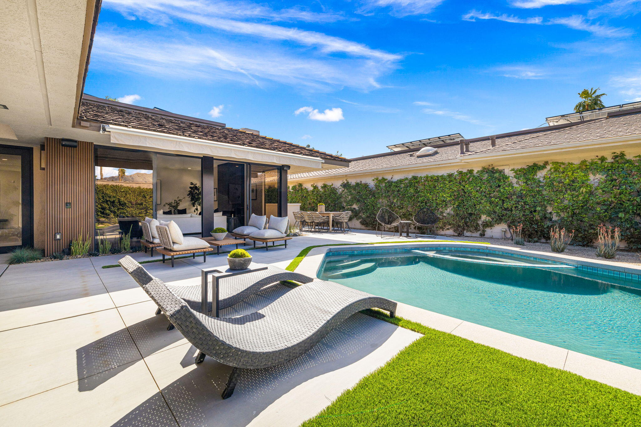 27 Colgate Drive Rancho Mirage, CA 92270 - Photo 7 of 87 a view of a patio with swimming pool table and chairs