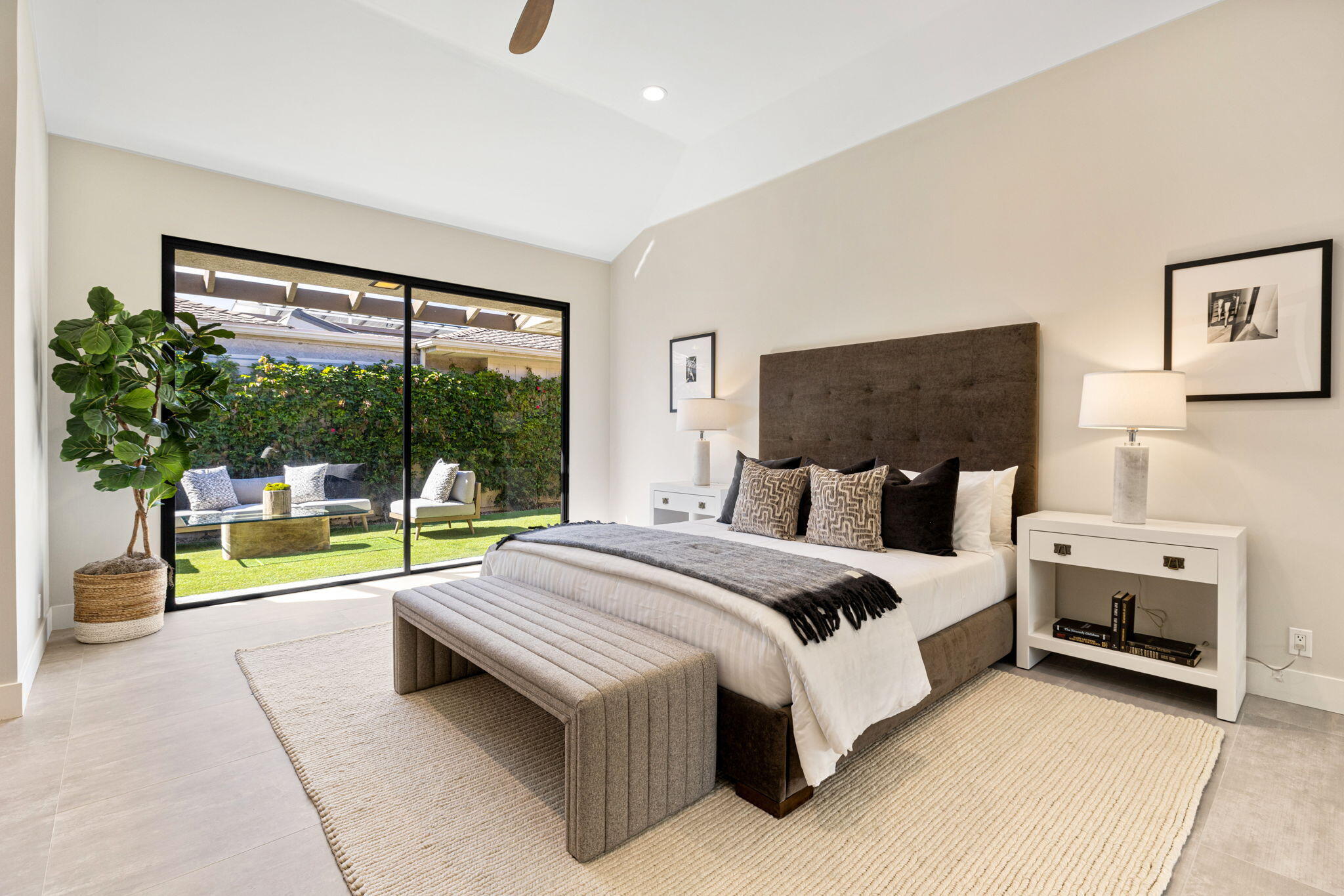 27 Colgate Drive Rancho Mirage, CA 92270 - Photo 73 of 87 a spacious bedroom with a bed and a large window