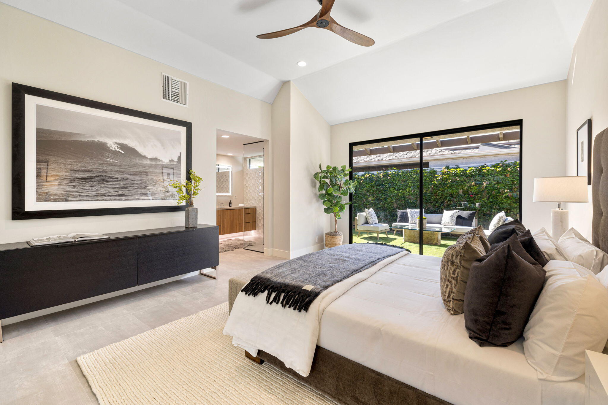 27 Colgate Drive Rancho Mirage, CA 92270 - Photo 74 of 87 a bedroom with a large bed and a large window