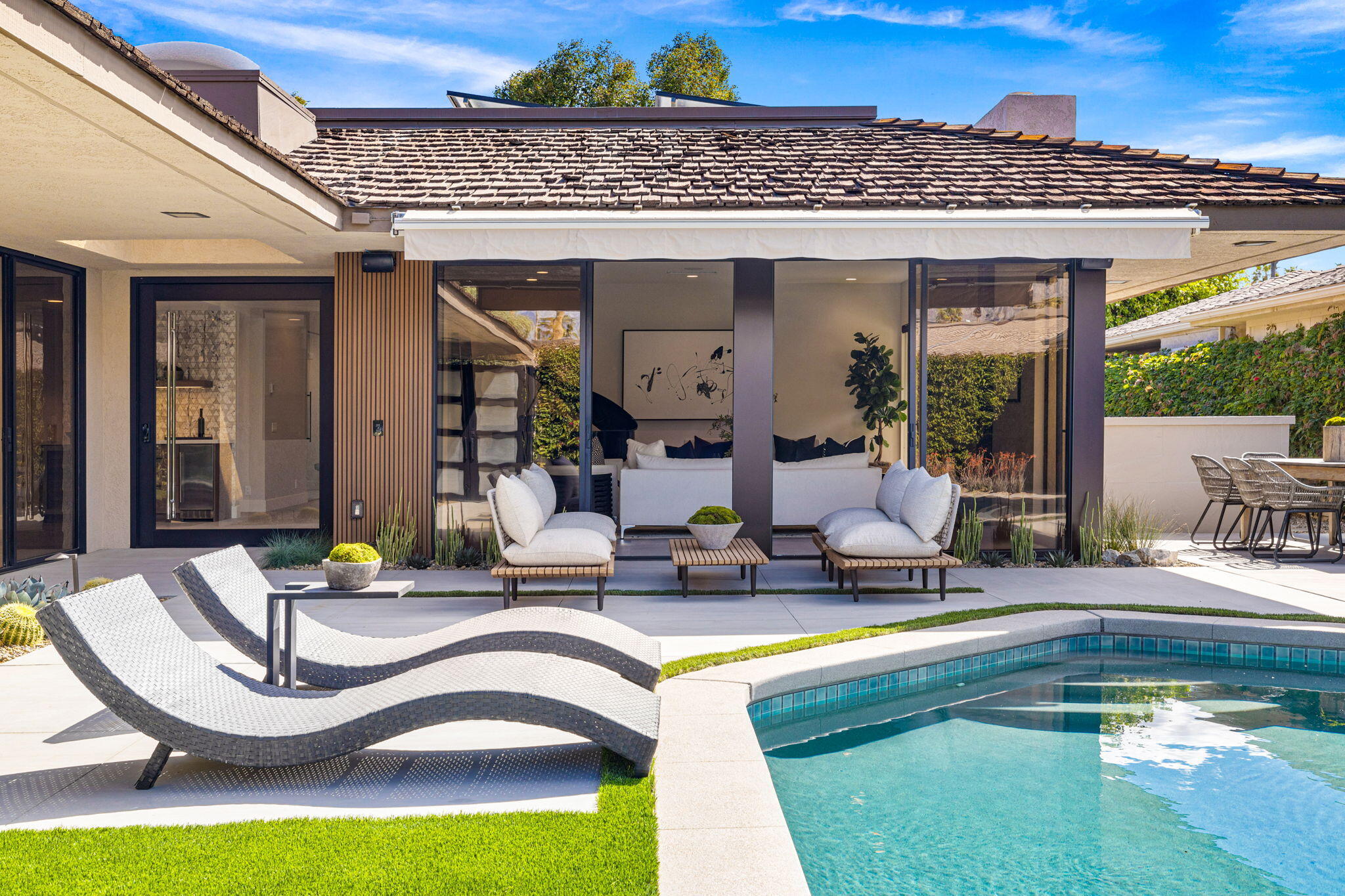 27 Colgate Drive Rancho Mirage, CA 92270 - Photo 8 of 87 a view of a house with swimming pool and furniture