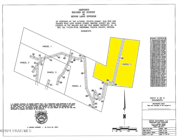 a view of a yard with trees