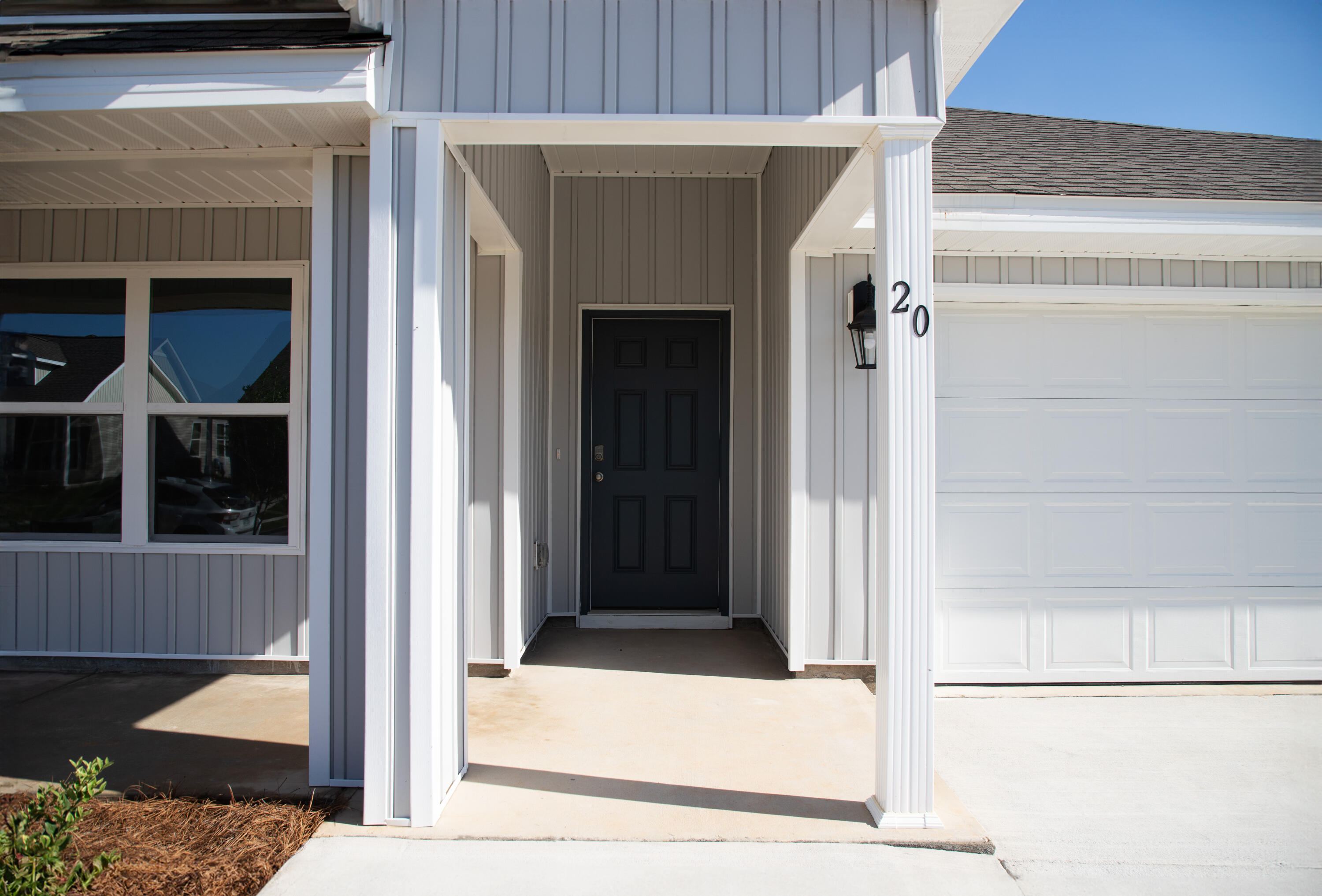 20 Bluebeech Street Freeport, FL 32439 - Photo 3 of 26 a view of a entryway door of the house