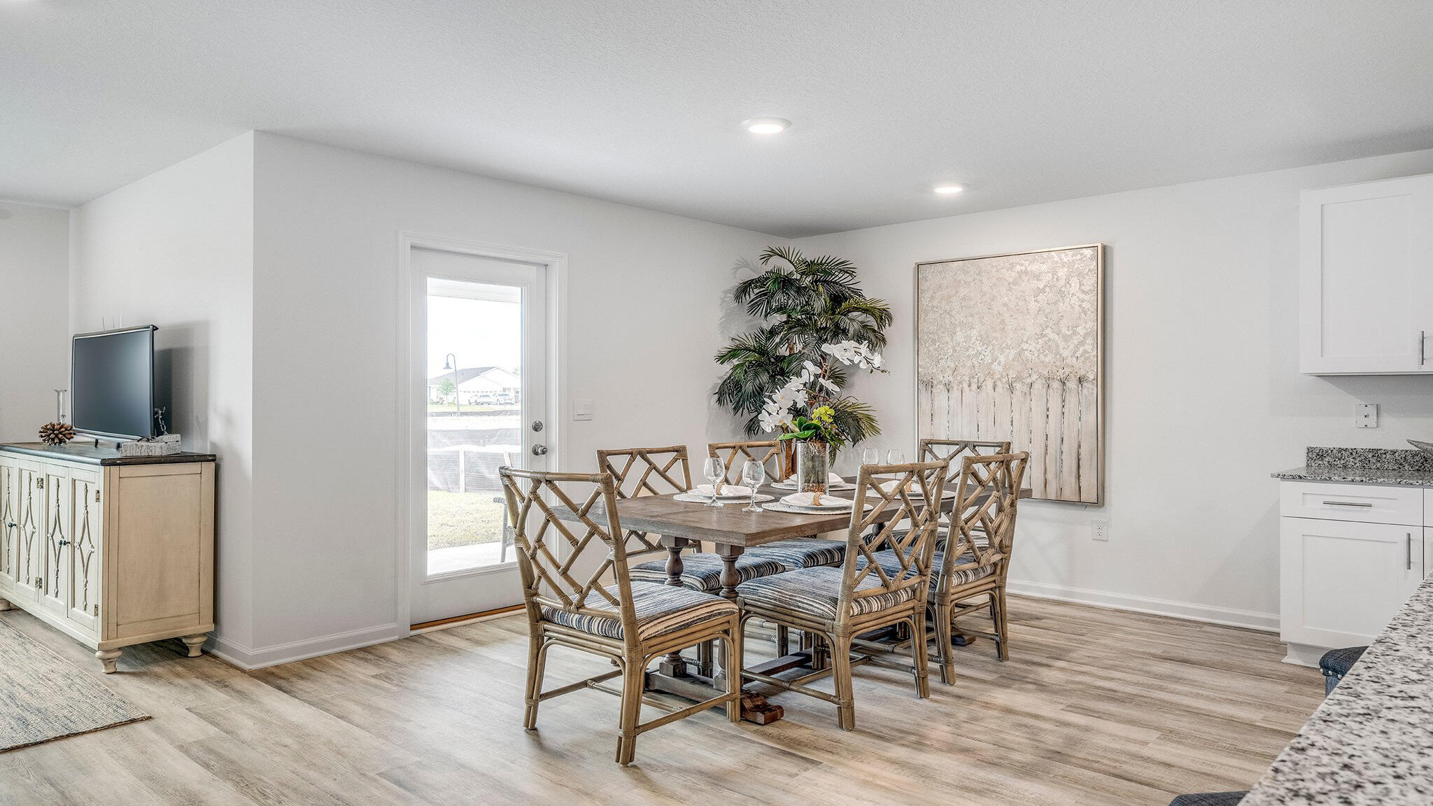 20 Bluebeech Street Freeport, FL 32439 - Photo 9 of 26 a view of a dining room with furniture and wooden floor