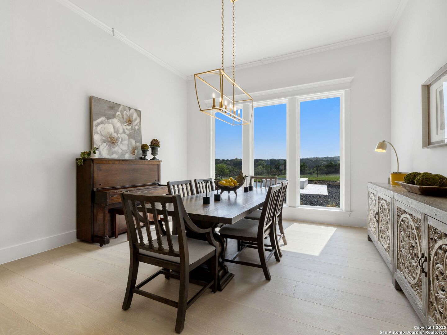 137 Phillip Ranch Road Boerne, TX 78006 - Photo 18 of 61 a dining room with furniture and window