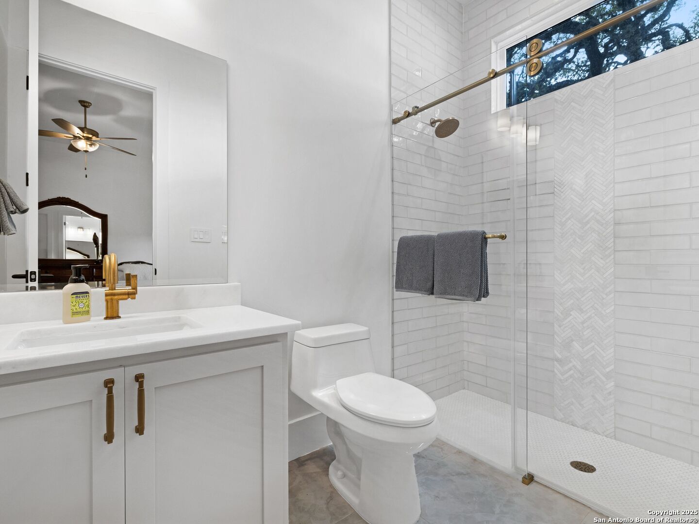 137 Phillip Ranch Road Boerne, TX 78006 - Photo 32 of 61 a bathroom with a sink a toilet and shower