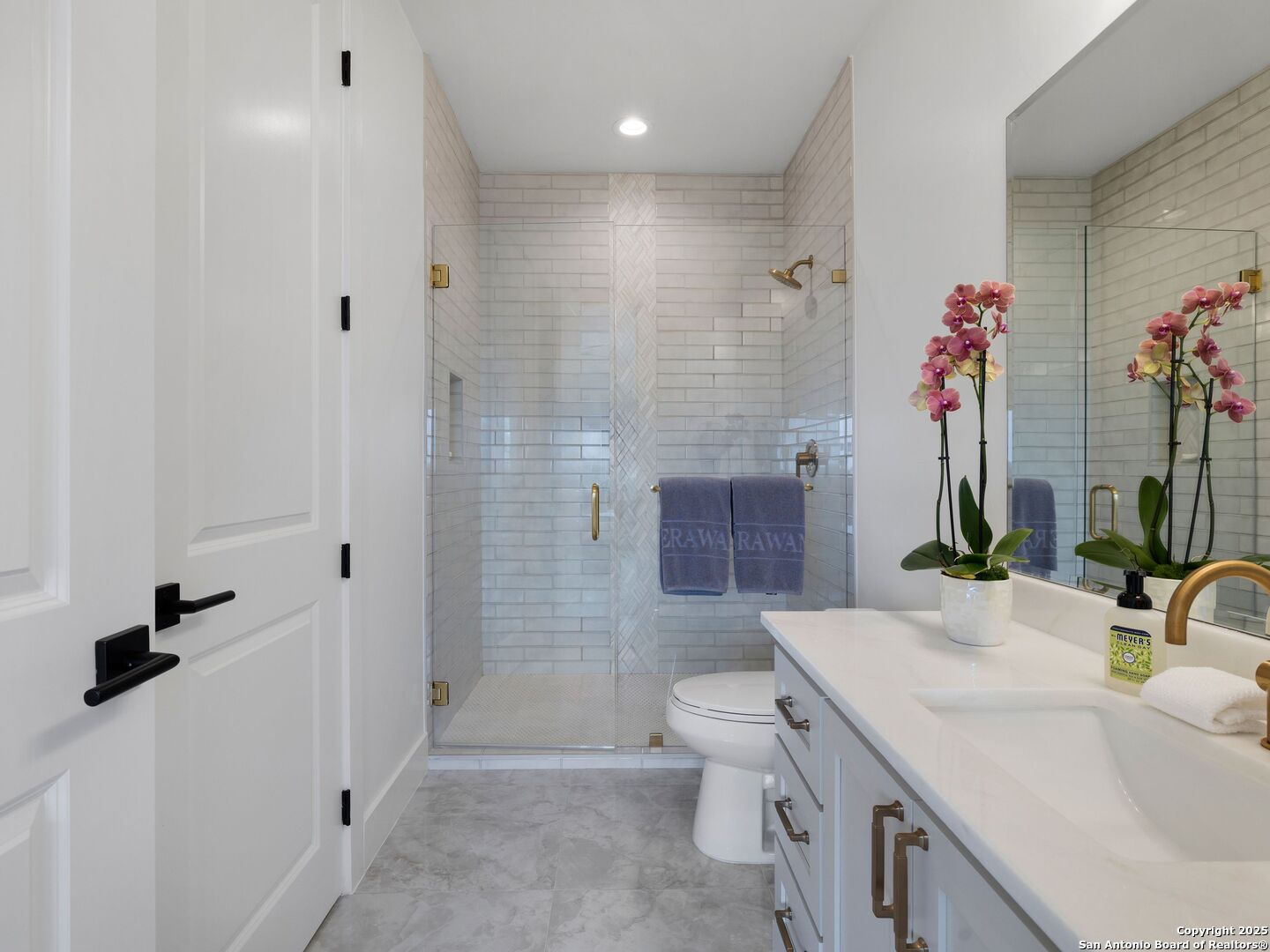 137 Phillip Ranch Road Boerne, TX 78006 - Photo 39 of 61 a bathroom with a sink a toilet and shower
