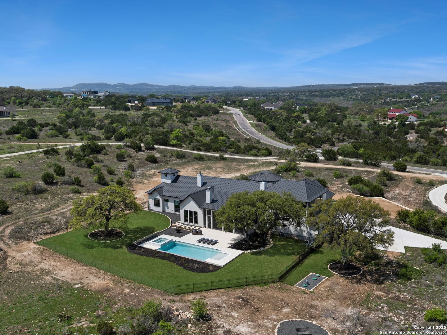 137 Phillip Ranch Road Boerne, TX 78006 - Photo 54 of 61 a view of a city with a lake