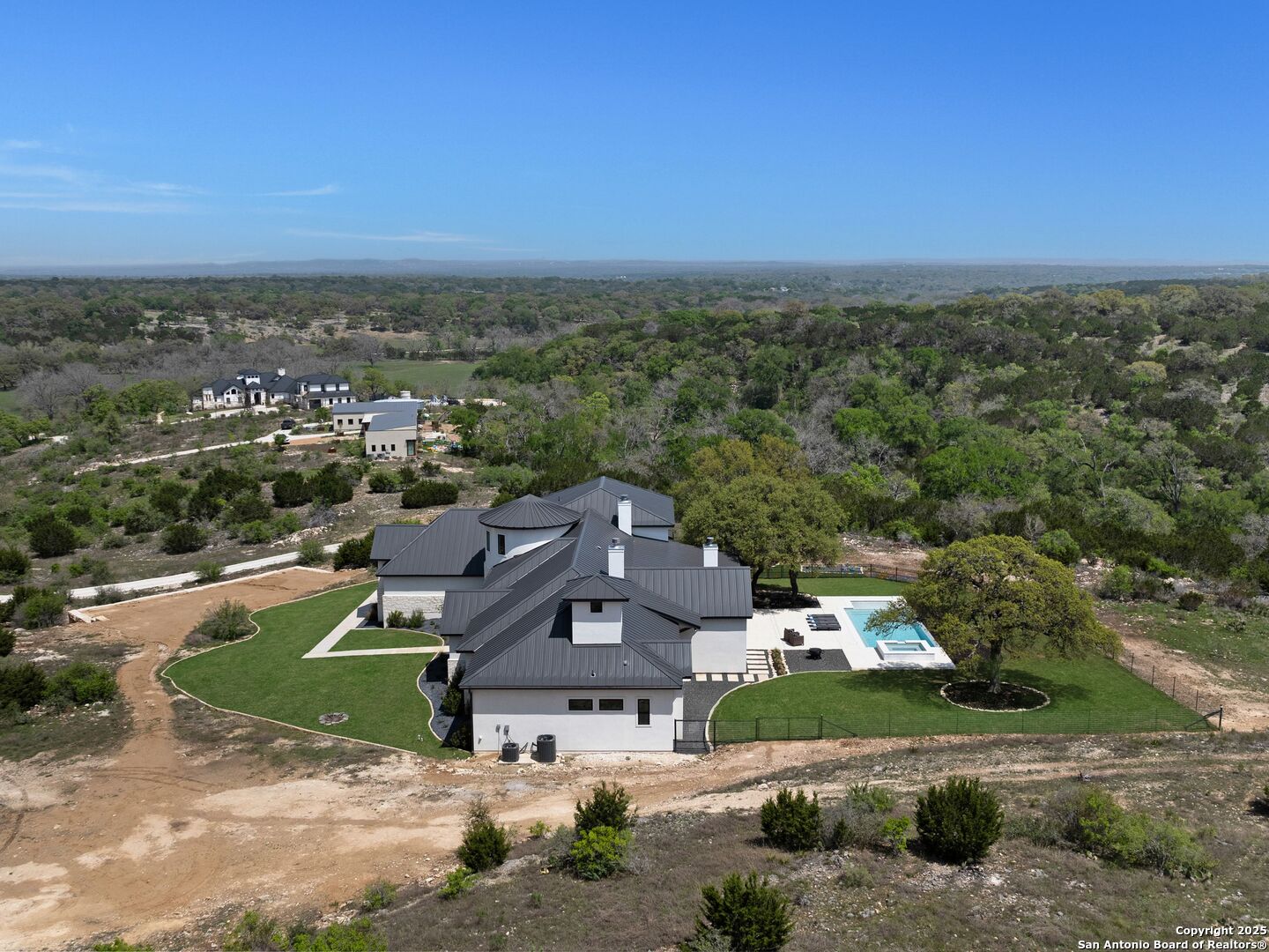 137 Phillip Ranch Road Boerne, TX 78006 - Photo 56 of 61 an aerial view of a house with a garden