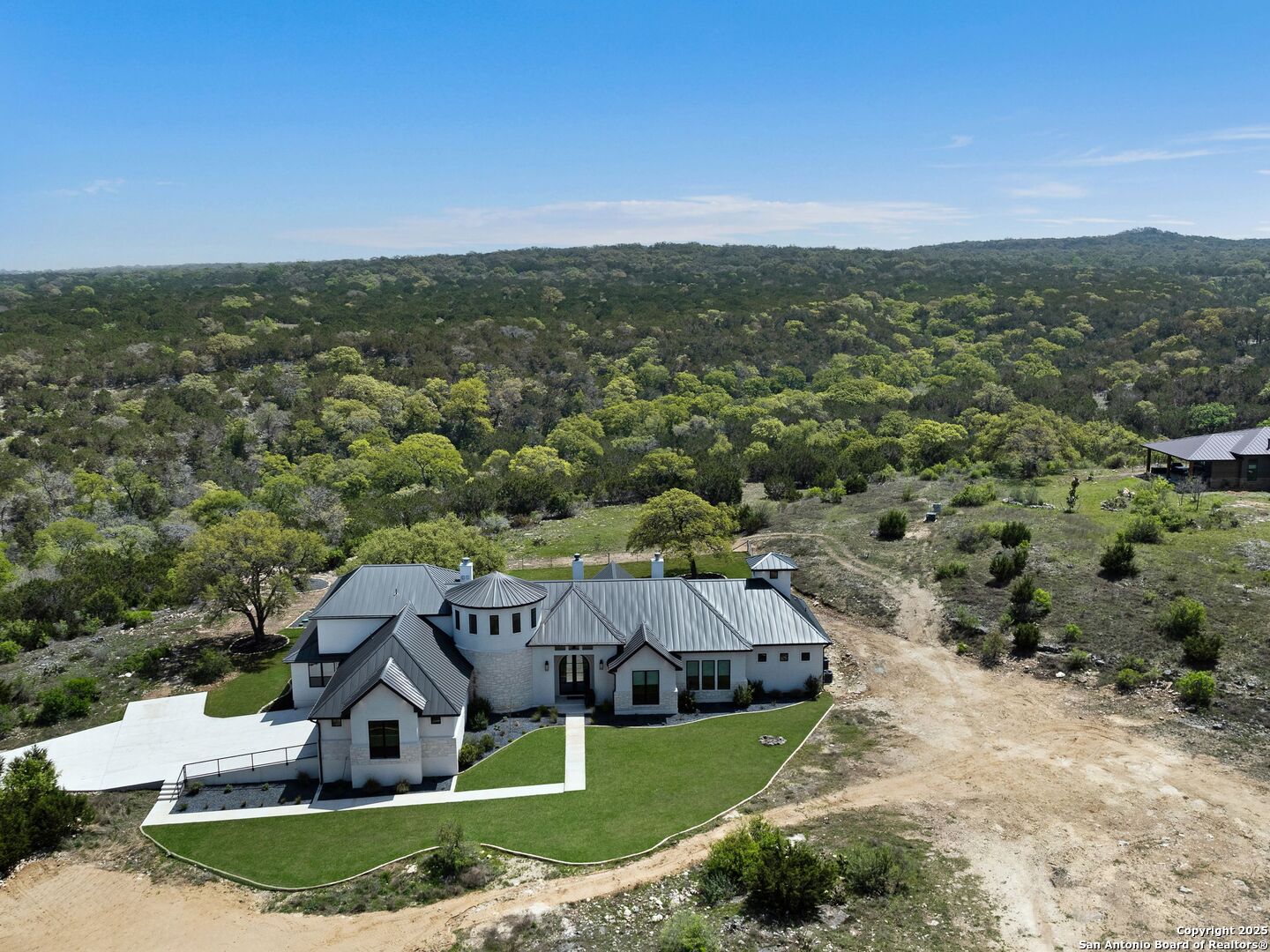 137 Phillip Ranch Road Boerne, TX 78006 - Photo 58 of 61 an aerial view of a house