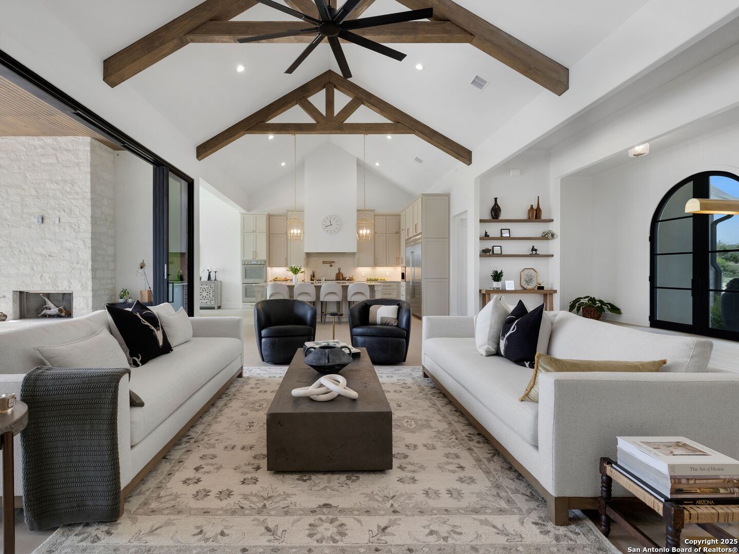 137 Phillip Ranch Road Boerne, TX 78006 - Photo 6 of 61 a living room with furniture and a ceiling fan