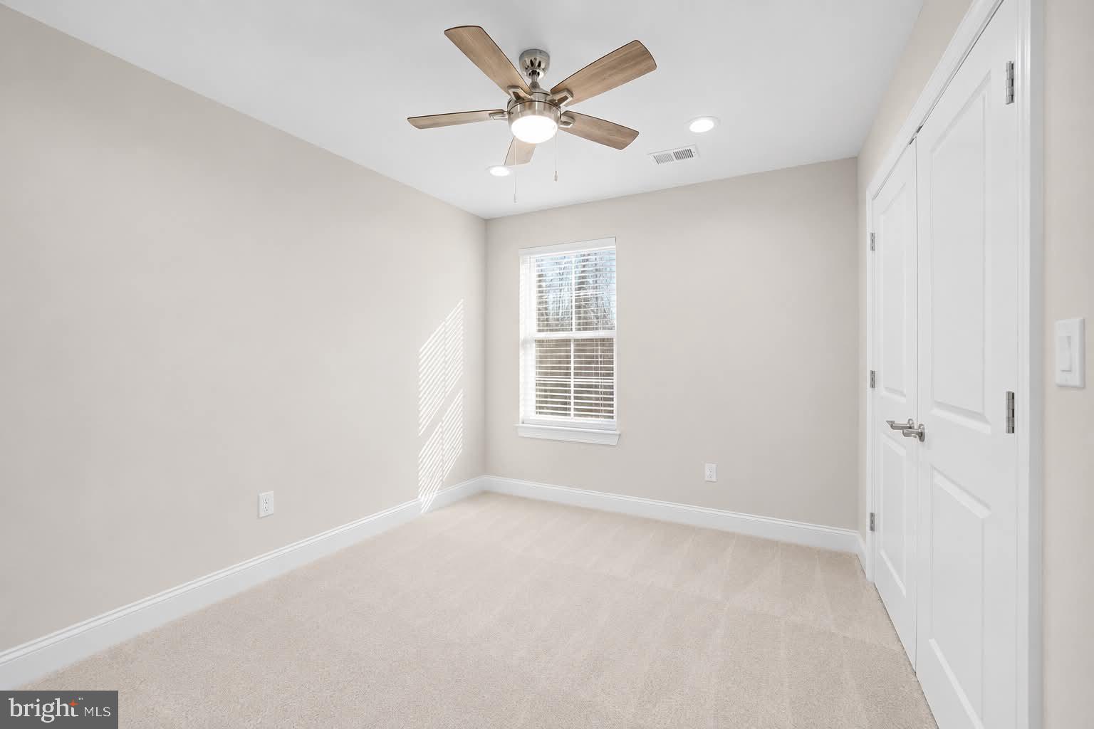 118 Ackerman Lane Ruther Glen, VA 22546 - Photo 25 of 57 a view of an empty room with a window