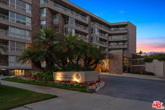 a view of a building with a garden