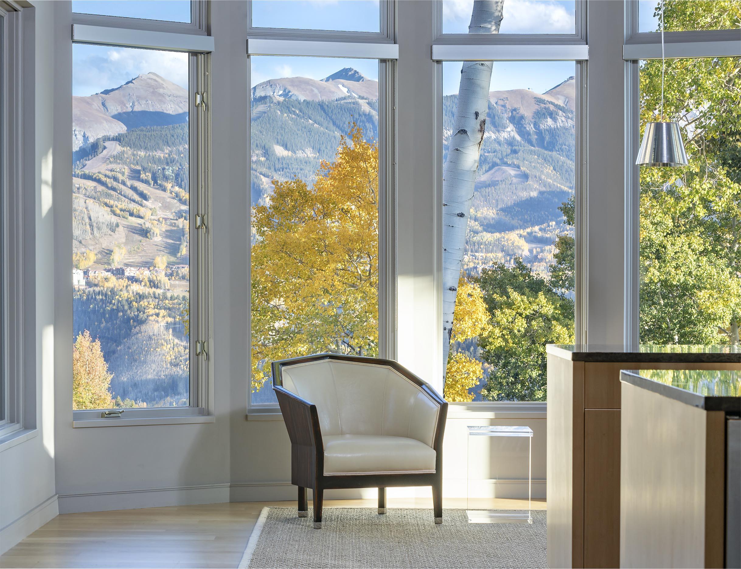 107 Miguel Road Telluride, CO 81435 - Photo 11 of 32 a balcony with furniture and a potted plant