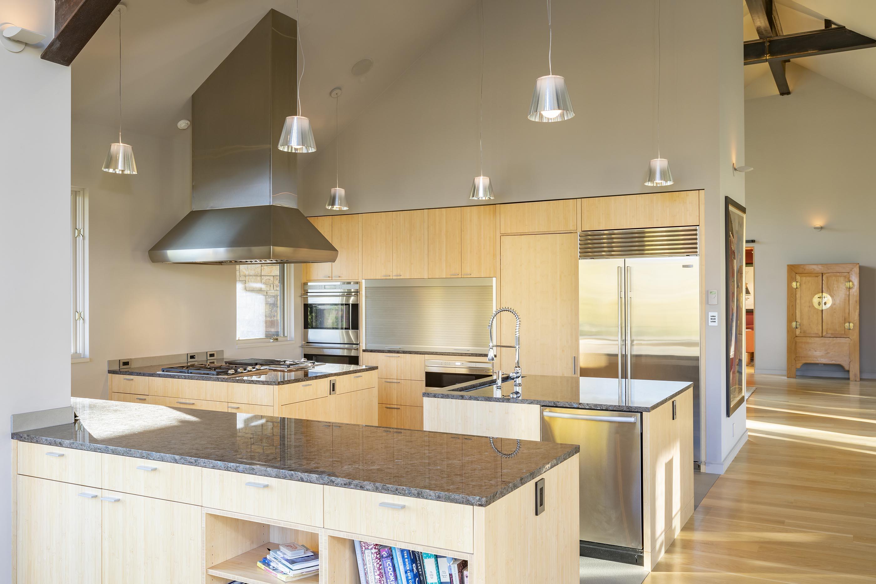 107 Miguel Road Telluride, CO 81435 - Photo 13 of 32 a kitchen with stainless steel appliances granite countertop a sink a stove and a wooden floors