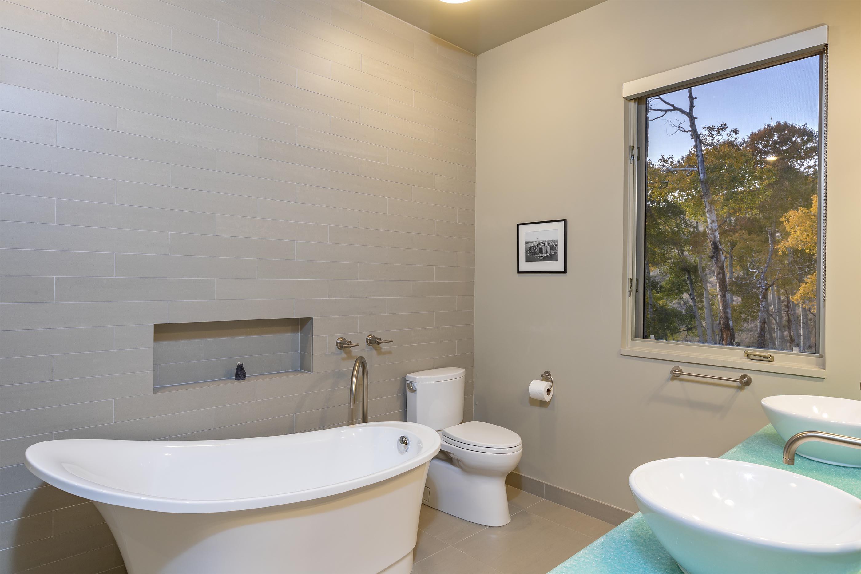 107 Miguel Road Telluride, CO 81435 - Photo 25 of 32 a white toilet sitting next to a bathroom sink