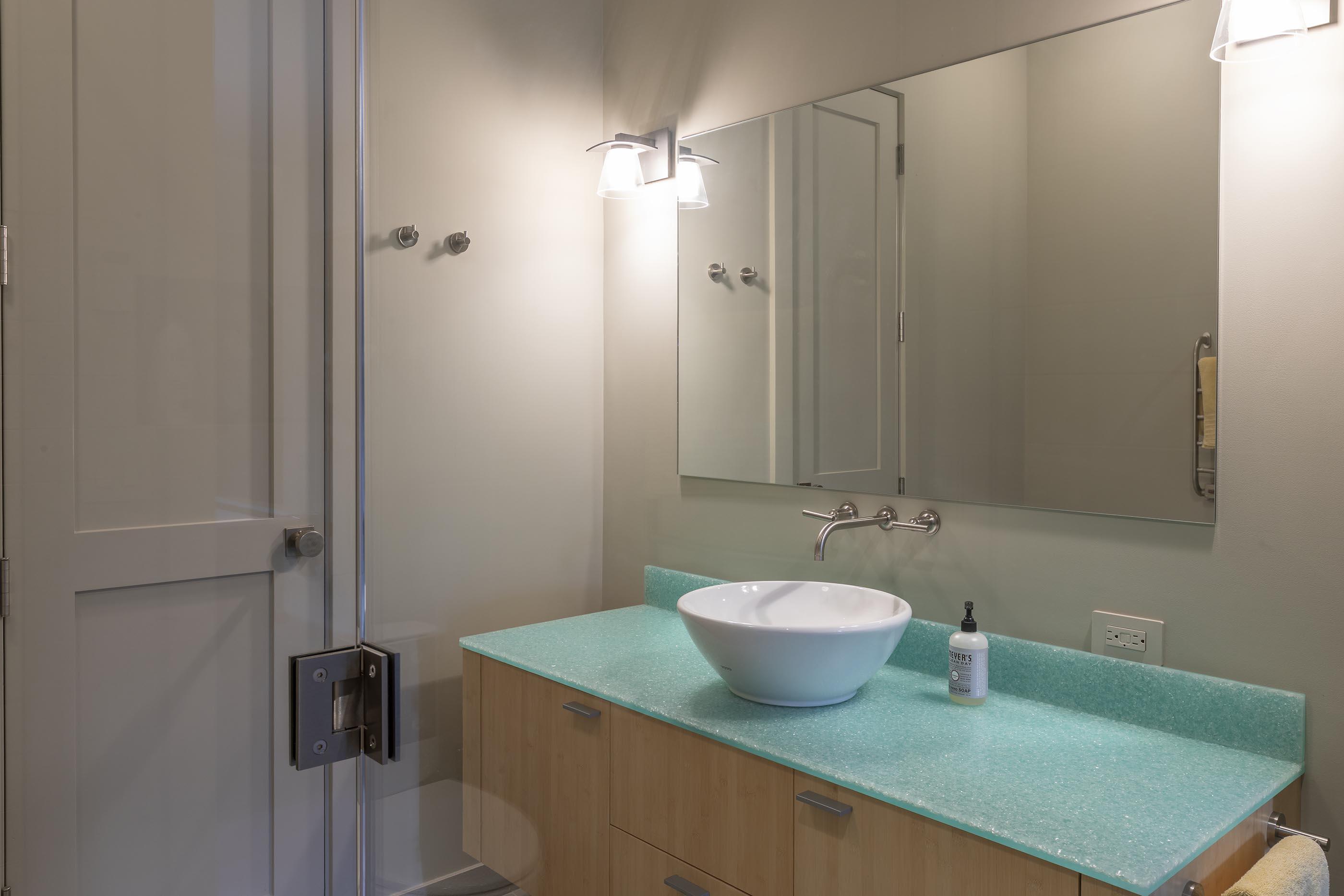 107 Miguel Road Telluride, CO 81435 - Photo 27 of 32 a bathroom with a sink and a mirror