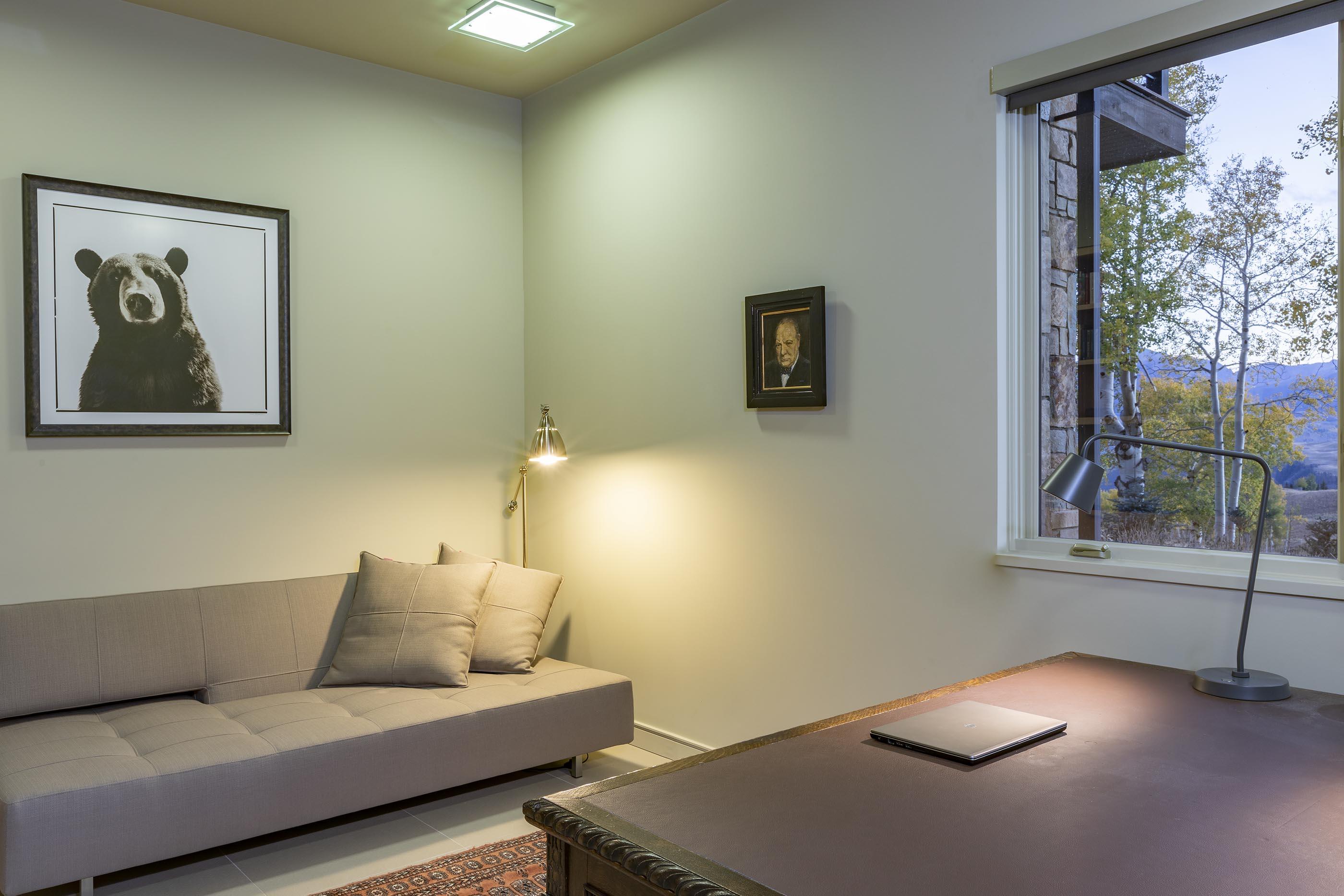 107 Miguel Road Telluride, CO 81435 - Photo 28 of 32 a living room with furniture and a flat screen tv