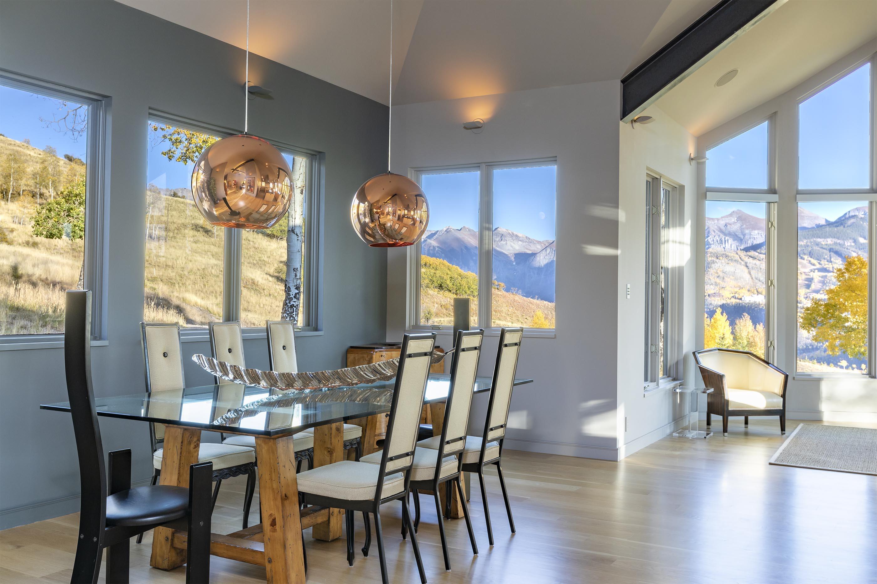 107 Miguel Road Telluride, CO 81435 - Photo 10 of 32 a view of a dining room with furniture window and wooden floor
