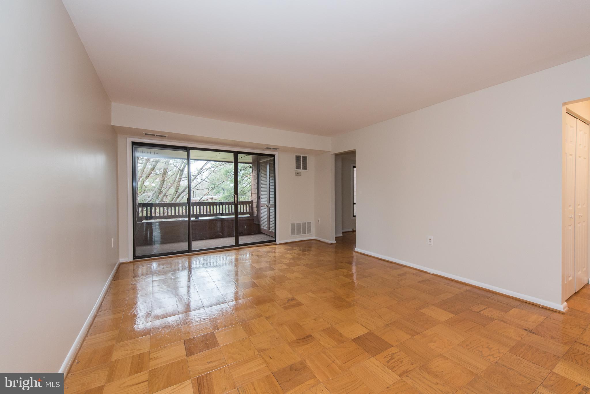 5232 West Running Brook Road, Unit 301 Columbia, MD 21044 - Photo 2 of 29 a view of an empty room with a window