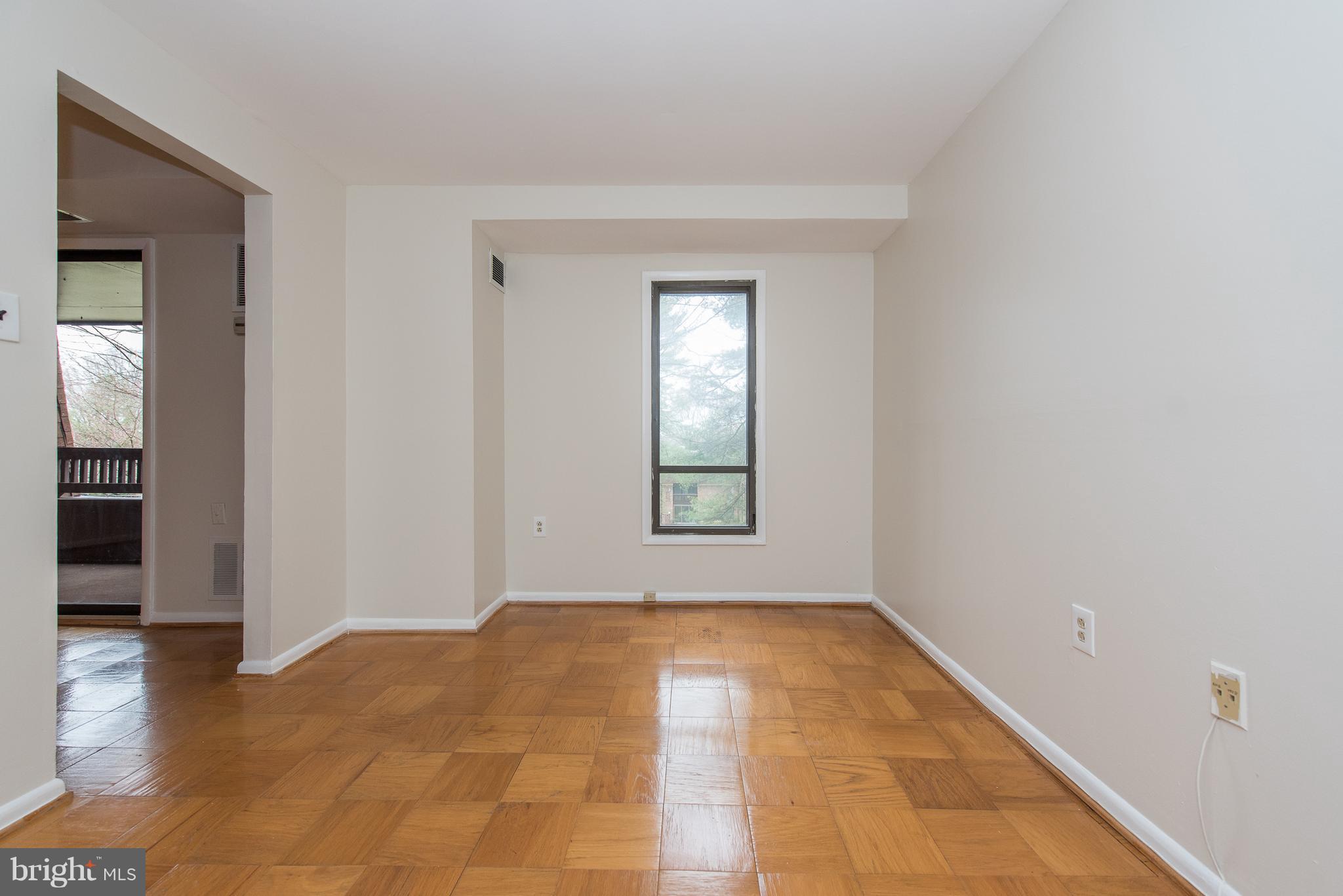 5232 West Running Brook Road, Unit 301 Columbia, MD 21044 - Photo 17 of 29 a view of an empty room and window