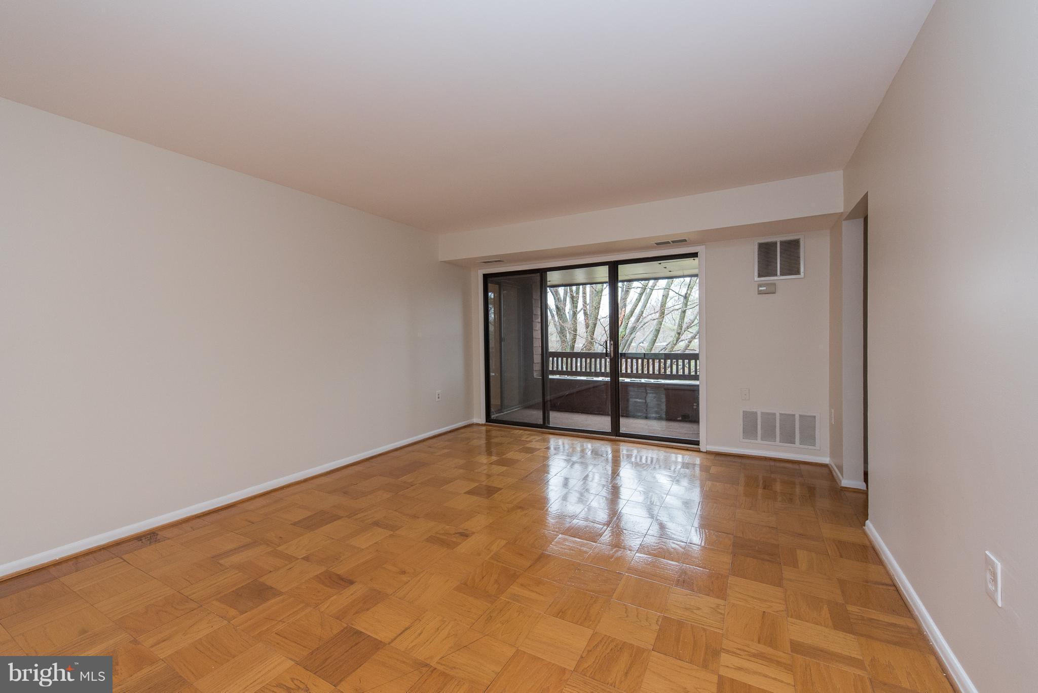 5232 West Running Brook Road, Unit 301 Columbia, MD 21044 - Photo 3 of 29 an empty room with windows