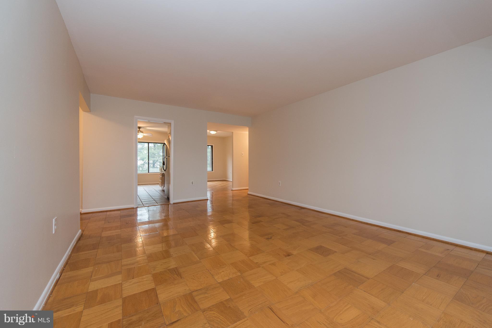 5232 West Running Brook Road, Unit 301 Columbia, MD 21044 - Photo 4 of 29 a view of an empty room and fire place