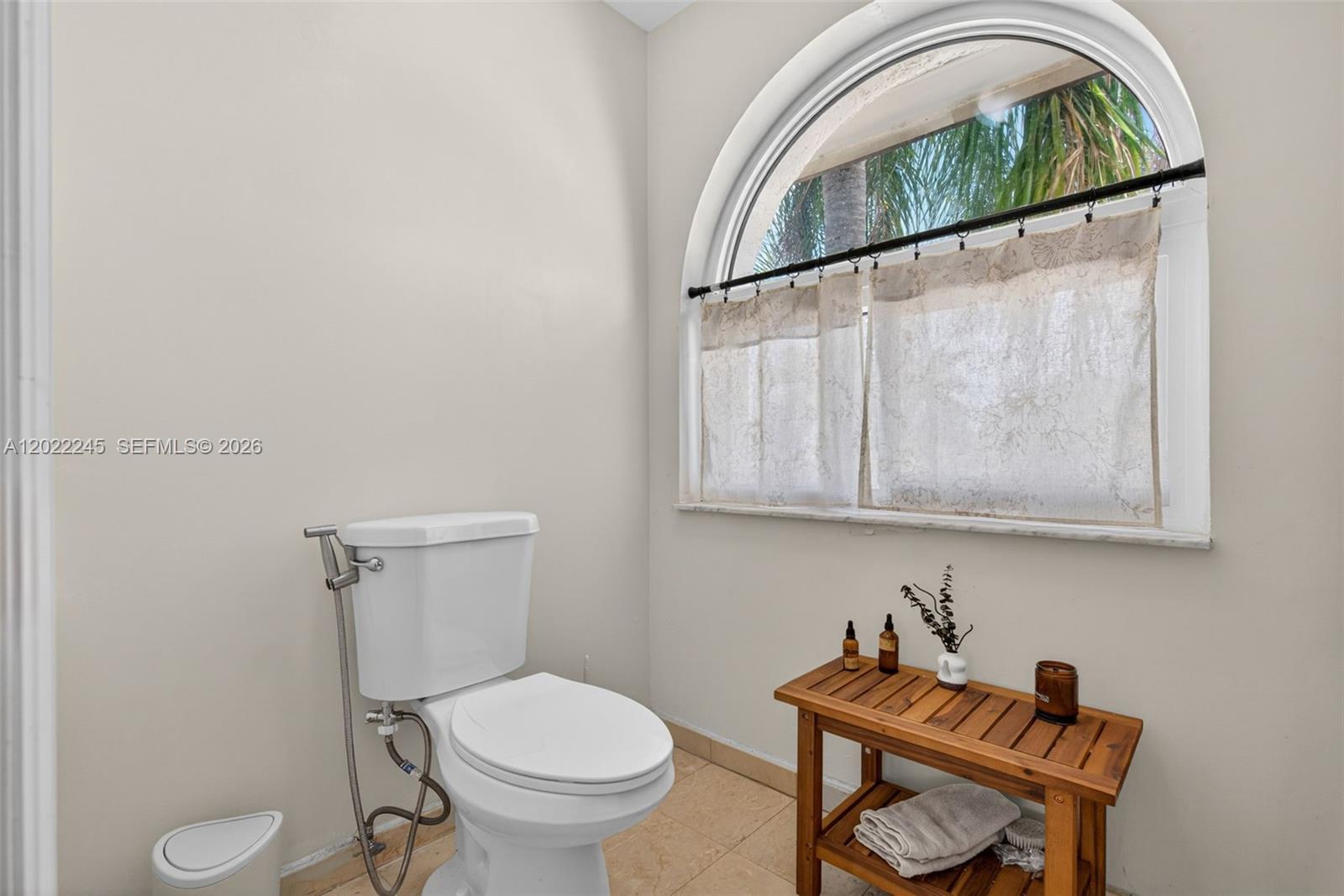 15530 Southwest 59th Street Miami, FL 33193 - Photo 29 of 58 a bathroom with a toilet and a sink