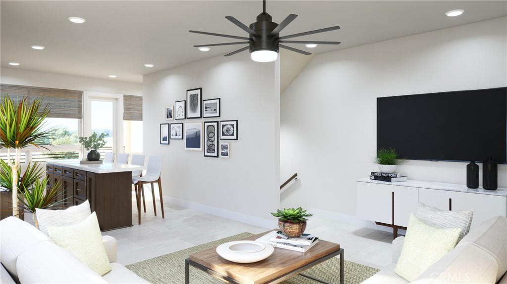 59 Bigsby Drive Stanton, CA 90680 - Photo 5 of 11 a living room with furniture and a flat screen tv