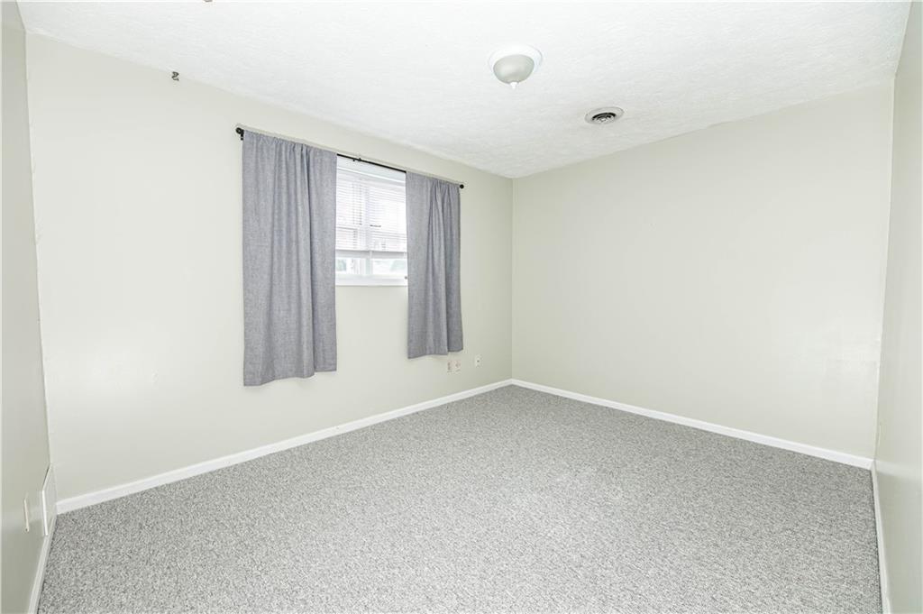 149 Canterbury Commons Indiana, PA 15701 - Photo 6 of 9 an empty room with a window